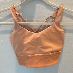 Lululemon Sports Bra. Size 4. Light orange color. Padded. Cup size A/B.